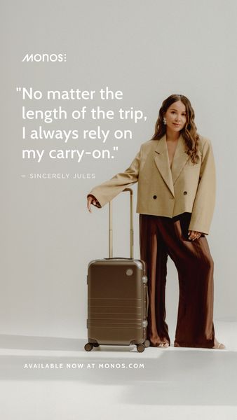 A vertical ad featuring a stylish woman in a beige blazer and brown pants standing next to a dark brown carry-on suitcase. The woman has long brown hair. The ad has a clean, minimalist aesthetic with a white background. Text overlays read a quote and a call to action.