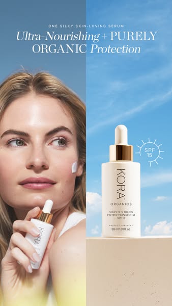 The ad is split vertically. On the left side, a woman is shown with a sample of the product on her face. On the right side, the product is shown with a blue sky and clouds in the background, and a sun symbol denoting SPF 15 protection. The woman is looking towards the product. Text includes the product description.