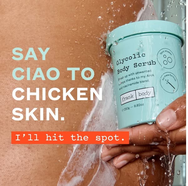 An ad for a body scrub. The image shows a person in the shower with water running down their body. The person is holding the body scrub product. Text on the image reads: 'SAY CIAO TO CHICKEN SKIN.' and 'I'll hit the spot.' The product packaging features the product name. The overall composition is clean and highlights the product's effectiveness.