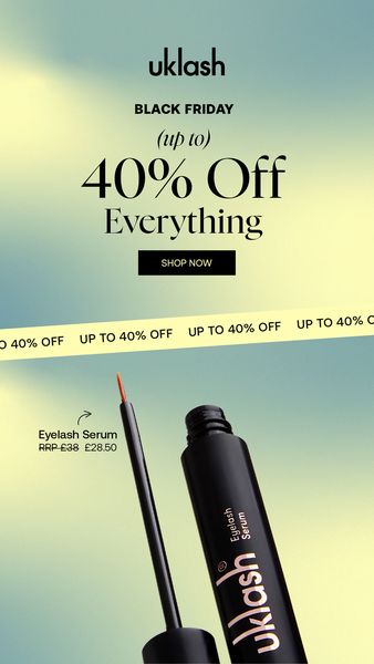 An ad for a beauty product, showcasing a black bottle of eyelash serum with the brand's logo, the top of the bottle is showing the applicator brush. The ad features a Black Friday sale banner promoting up to 40% off of everything, and the price of the product is displayed at its original and sale price. The background gradient is light yellow and mint green.