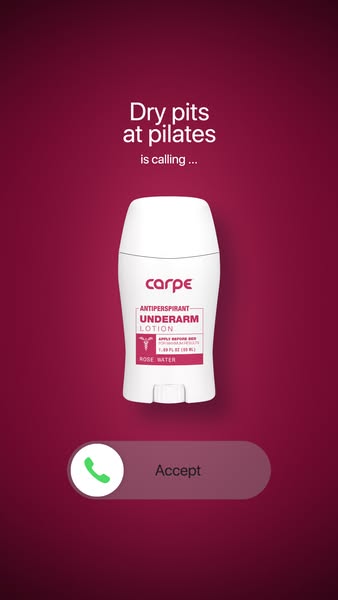 The ad features a product shot of an antiperspirant lotion against a burgundy background. The product is a white, cylindrical bottle with the brand name at the top and product details below. Text at the top reads "Dry pits at pilates is calling..." The bottom of the ad shows a simulated phone call with an "Accept" button.