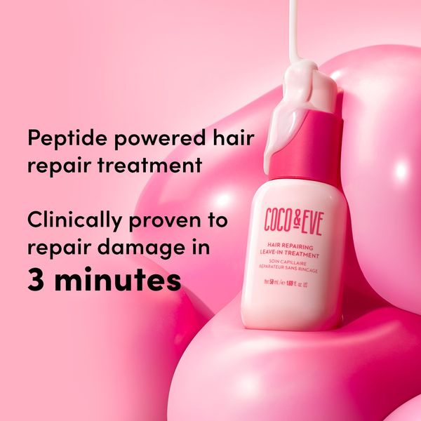 The image shows a hair care advertisement. The main focus is on a white bottle of hair repair treatment that has a pink lid, with product pouring out. The bottle is set against a backdrop of pink, balloon-like shapes. Text on the bottle is visible. Text on the left side of the image highlights the product's benefits. The overall composition is clean and visually appealing. The color scheme is predominantly pink and white, creating a feminine and beauty-focused aesthetic.