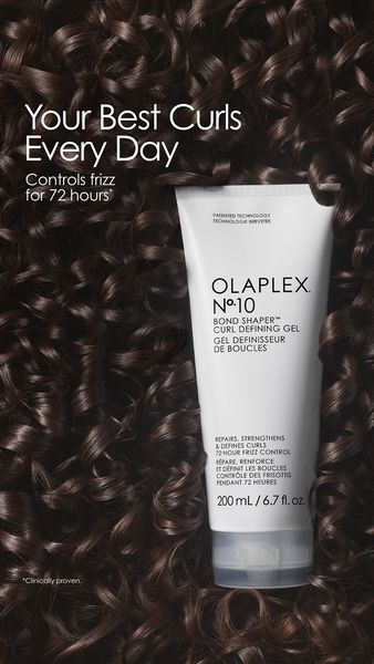 The ad features a close-up of dark, voluminous, and perfectly defined curly hair. The background is filled with similar curly locks. A white tube of hair styling product is centered with the product name prominently displayed. Text overlayed on the image provides information about the product, including its benefits, like frizz control and long-lasting results, and a claim that it's clinically proven. The layout is clean, with text and product placement ensuring the advertisement is focused on the hair product and its promises.