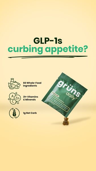 The ad features a vertical layout on a light yellow background. At the top, in dark green, are the words "GLP-1s curbing appetite?" with a question mark. Below, the image shows a dark green packet propped up with a brown gummy bear, with the brand name. To the left of the packet are outlined graphics for whole food ingredients, vitamins and minerals, and net carbs with associated text. The overall composition is simple, clean, and informative.