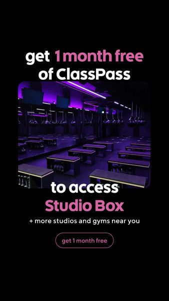 An advertisement featuring a dark background with the text and an image of a gym. On the top, there's a text that says "get 1 month free of". Below, there is a picture of a gym interior with exercise equipment. Under the image we see the words "to access Studio Box" written in white. Following this, text is written "+ more studios and gyms near you". Finally, there is a call-to-action button at the bottom that prompts users to "get 1 month free". The overall composition uses a color scheme of black, white, and magenta to create a visually appealing display.