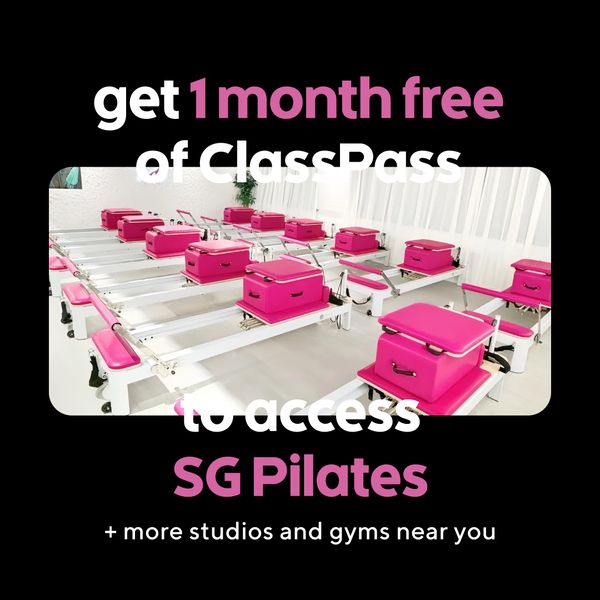The ad is designed with a black background and bold white text. The focal point is an interior shot of a pilates studio, showcasing multiple pilates machines with pink accents. The ad features the text 'get 1 month free of ClassPass' to incentivize users. Other text includes 'to access SG Pilates' and '+ more studios and gyms near you'.
