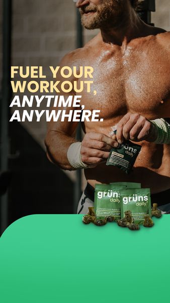 The ad showcases a muscular, sweaty man preparing to use the featured product. Text emphasizes fueling workouts anytime, anywhere. The man is in the upper half, centered, while the product packaging and green background are in the lower half. The overall tone suggests energy, fitness, and an active lifestyle. The background has a blurred-out effect behind the man. The product is displayed in a bag containing what appears to be small, dark green fruit-like pieces. The products packaging is centered. The lighting is natural and focuses on the man's body.