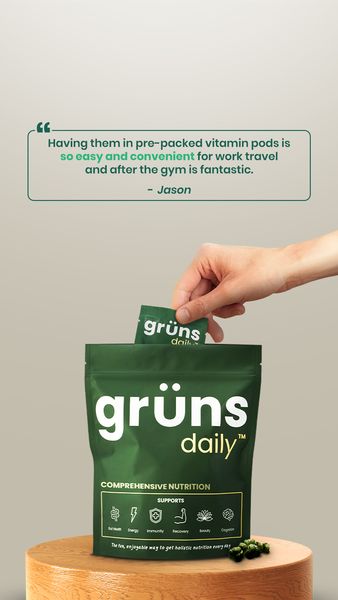 An ad showcasing a green bag of vitamin pods on a wooden stand against a light background. A hand is pulling out a small packet from the bag. Text in a speech bubble above provides a testimonial highlighting the convenience of the product. The bag contains a product name, supplemental information, and icons representing the benefits of nutrition.