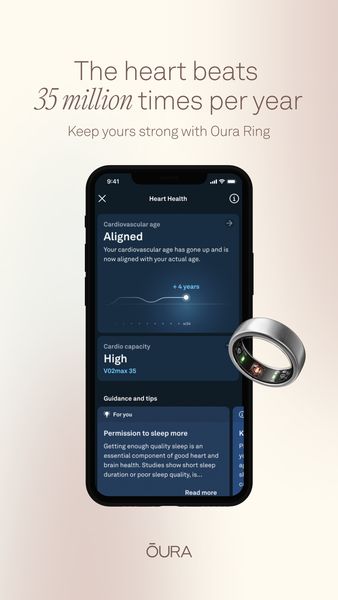The ad showcases a smartphone displaying a health app interface and a sleek silver smart ring. The background is a gradient of light colors. The phone displays heart health data, including cardiovascular age and cardio capacity. Text at the top mentions the heart beating 35 million times per year, with a tagline promoting strong heart health, and a brand name identified at the bottom of the image. The smart ring floats next to the phone in the upper right.