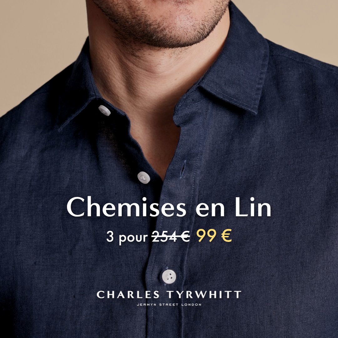A close-up, chest-up shot of a man wearing a dark navy blue linen shirt. The shirt is unbuttoned at the collar, revealing a bit of his neck and stubble. White text overlays the image, with the largest text reading "Chemises en Lin" (Linen Shirts). Below this, in a smaller font, it says "3 pour 254€ 99€", indicating a promotional price. At the bottom of the image, the brand name "CHARLES TYRWHITT" is displayed, followed by "JERMYN STREET LONDON" in smaller text.