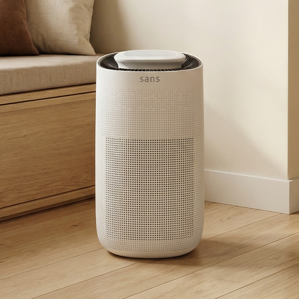 A clean, white air purifier with the brand name "sans" is shown in a well-lit, minimalist room with wooden floors and a wooden bench with cushions. The text overlay begins by posing a relatable question about the unseen threat of airborne particles in the air, contrasting it with visible hygiene practices. It then transitions into explaining how the air purifier addresses this issue by detailing its filtration capabilities and benefits.