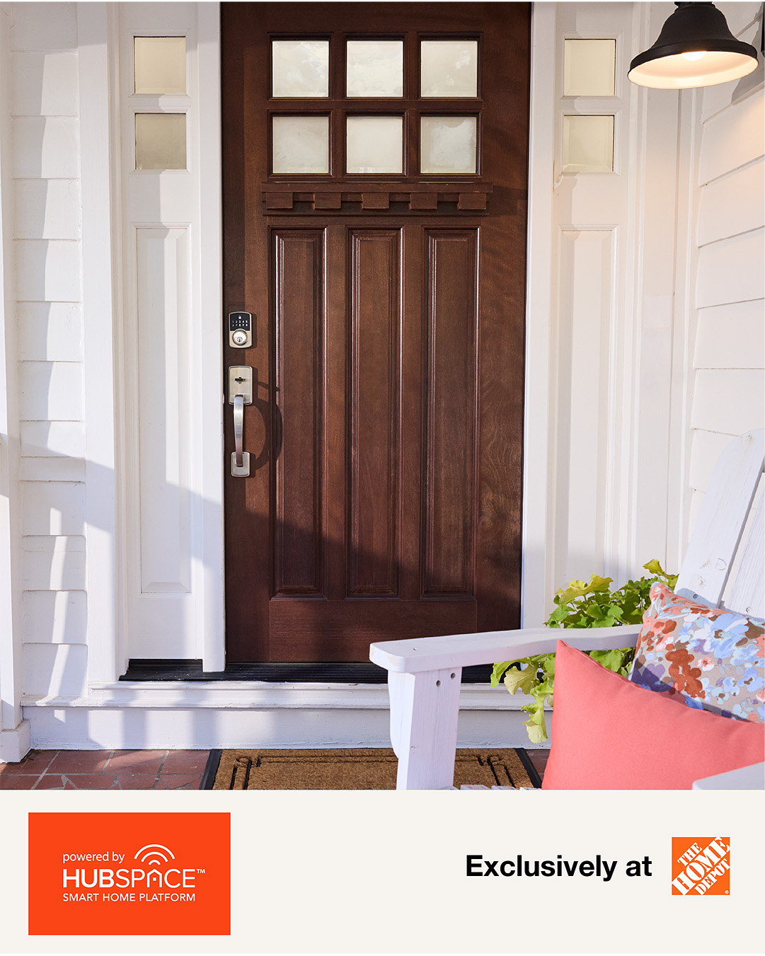 The image shows the front door of a house with a smart lock installed. A white Adirondack chair with colorful pillows sits on the porch to the right of the door. In the bottom left corner, there is an orange square with the Hubspace logo and the text "powered by HUBSPACE SMART HOME PLATFORM". To the right of the logo, the text "Exclusively at" is displayed, followed by The Home Depot logo. The creative highlights the smart lock and its associated app, suggesting convenience and home security.