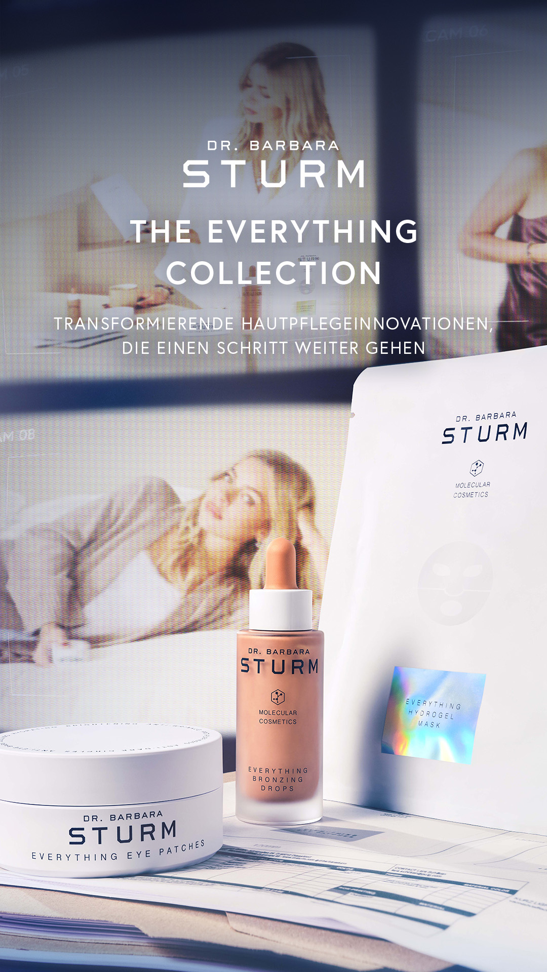 The creative showcases the Dr. Barbara Sturm 'Everything Collection' with several products arranged on a desk. The background features blurred images of women, possibly in a studio or office setting, with text overlays. The main text highlights 'THE EVERYTHING COLLECTION' and 'TRANSFORMIERENDE HAUTPFLEGEINNOVATIONEN, DIE EINEN SCHRITT WEITER GEHEN'. The copy introduces innovative multi-talents with immediate effects, specifically mentioning the new Everything Hydrogel Mask.