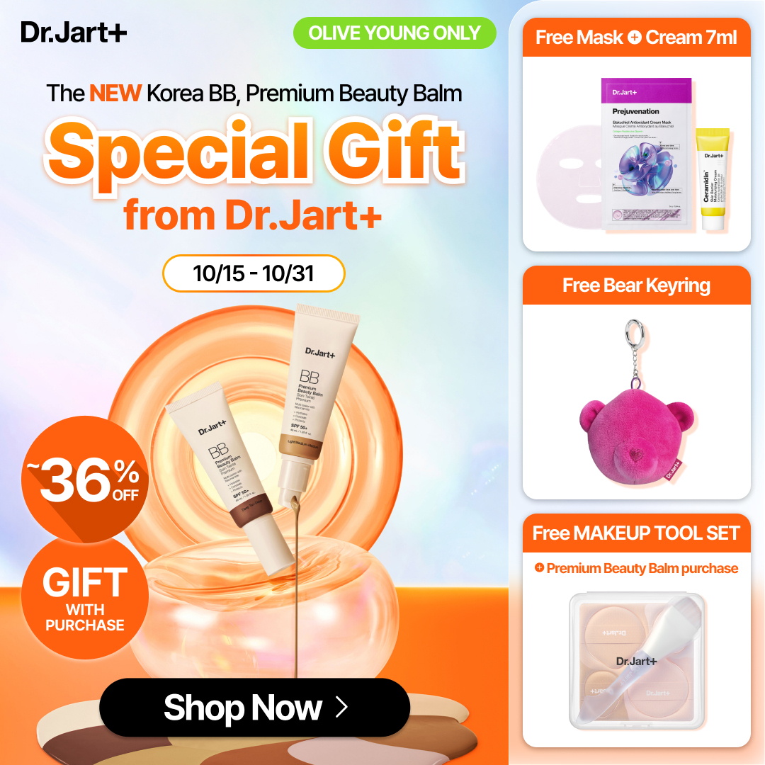 The creative features a Dr. Jart+ product image with text overlays. The main visual shows two tubes of BB cream with a golden liquid dripping from one. Around the product, there are circular graphics and text highlighting "~36% OFF" and "GIFT WITH PURCHASE". The top section of the ad displays "The NEW Korea BB, Premium Beauty Balm Special Gift from Dr.Jart+" and a date range of "10/15 - 10/31". The right side of the ad details three gift offers: "Free Mask + Cream 7ml", "Free Bear Keyring", and "Free MAKEUP TOOL SET". A prominent "Shop Now" button is at the bottom.