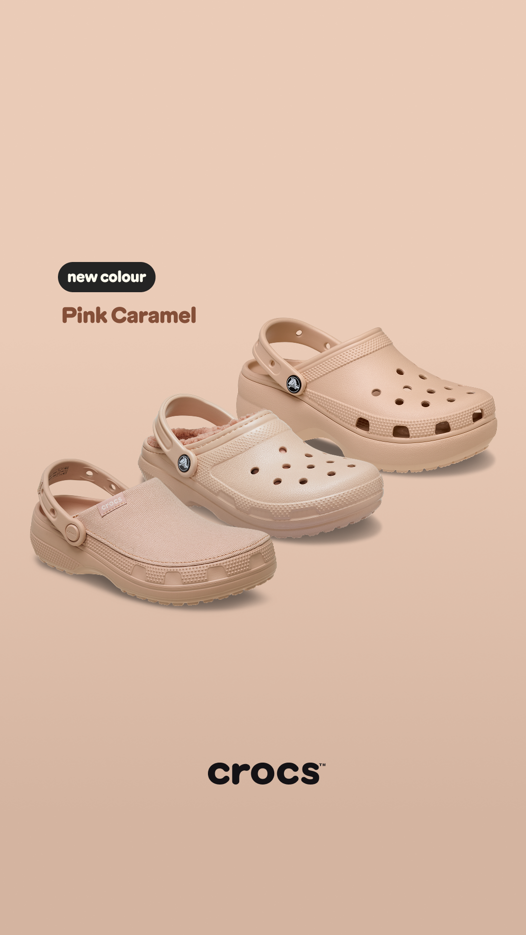 Three pairs of Crocs shoes in varying styles are displayed against a soft peach background. The shoes are all in shades of pink and beige. Text overlay in the top left corner reads "new colour" in a white rounded rectangle with black text. Below this, "Pink Caramel" is written in a larger, serif font. The Crocs logo is visible at the bottom right of the image.