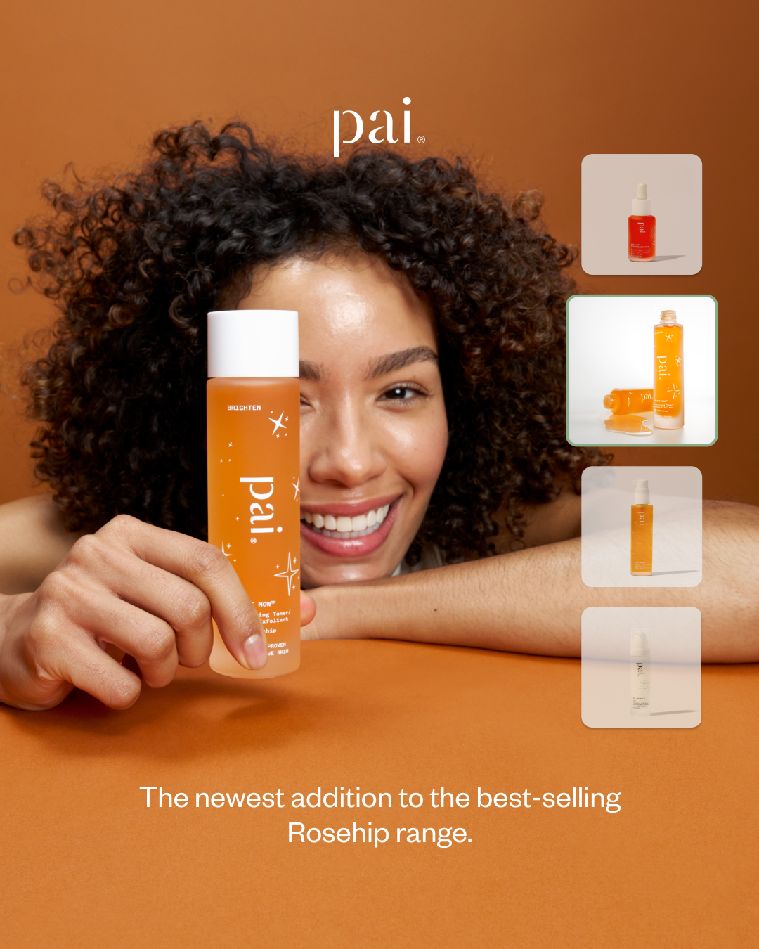 A smiling woman with curly hair is holding a bottle of Pai Skincare's "BRIGHTEN" serum. The bottle is clear with an orange liquid and a white cap, featuring the Pai logo. Around the bottle, there are small white starburst graphics. To the right of the main image, four smaller inset images showcase different Pai Skincare products, including dropper bottles and spray bottles. The text "The newest addition to the best-selling Rosehip range." is displayed at the bottom of the image.