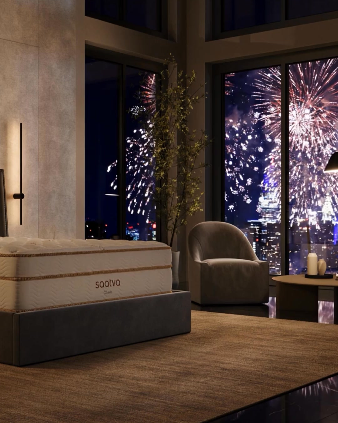 A luxurious bedroom scene is depicted at night, with a large window overlooking a city skyline illuminated by fireworks. In the foreground, a Saatva mattress is prominently displayed on a bed frame. The room features a plush armchair and a small side table, creating an elegant and comfortable atmosphere. The on-screen text encourages viewers to prioritize sleep during the Fourth of July holiday with Saatva.