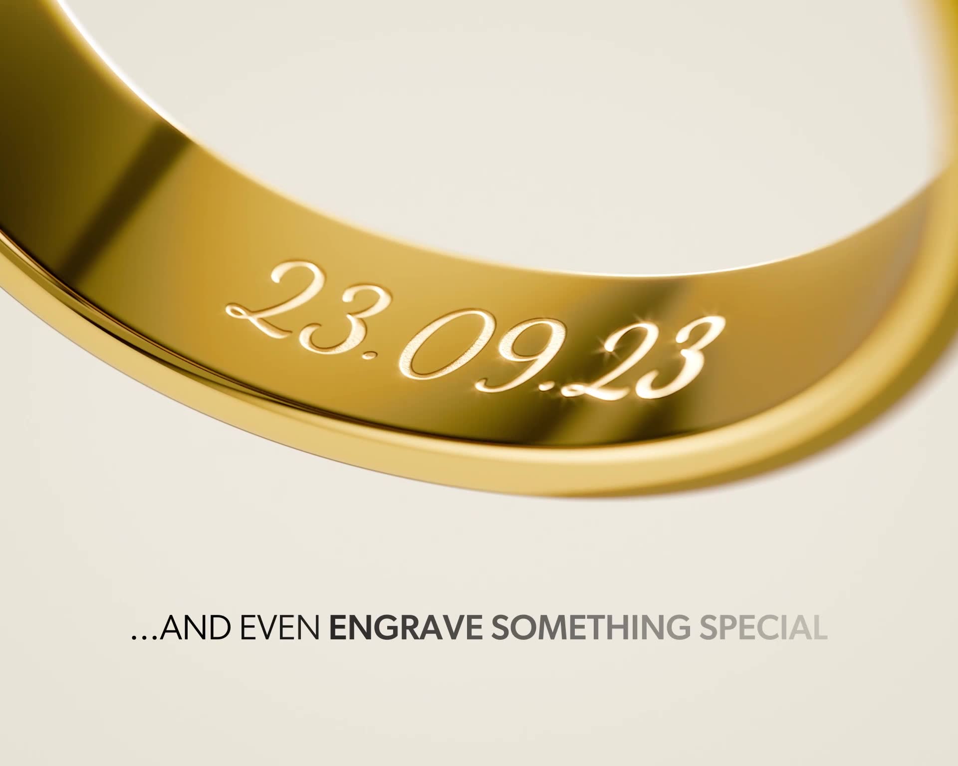 A close-up, angled shot of a gold ring with the date "23.09.23" engraved on its surface. The background is a soft, neutral beige. Below the ring, the text "...AND EVEN ENGRAVE SOMETHING SPECIAL" is displayed in a simple, sans-serif font. The creative highlights the personalization option of engraving a special date onto the ring.