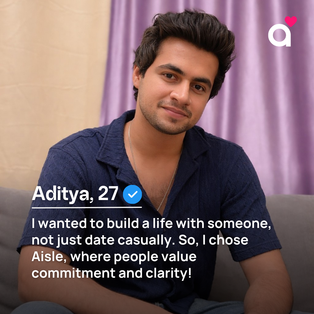A young man named Aditya, aged 27, is featured in a portrait-style image. He is looking directly at the camera with a slight smile. Text overlays the image, stating his name and age, followed by a quote about his desire for a committed relationship and his choice of the Aisle dating app for its focus on commitment and clarity. The background consists of a blurred purple curtain and a grey sofa.