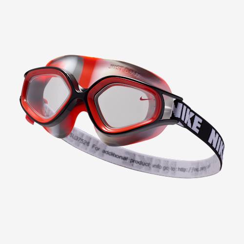 A pair of red and black Nike swimming goggles is shown against a light gray background. The goggles have a striped pattern on the head strap and the Nike logo is visible on the side. Text overlays the image, announcing special benefits for Nike members, including installment payments with participating cards, and directing users to check terms and conditions.