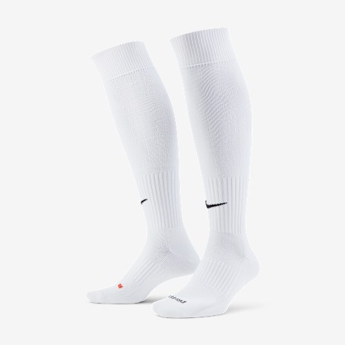 A pair of white Nike athletic socks are shown from the knees down against a plain white background. The socks have the Nike swoosh logo in black on the calf area. The copy overlays the image, announcing special benefits for Nike members, including installment payments with participating cards, and directing users to check terms and conditions.