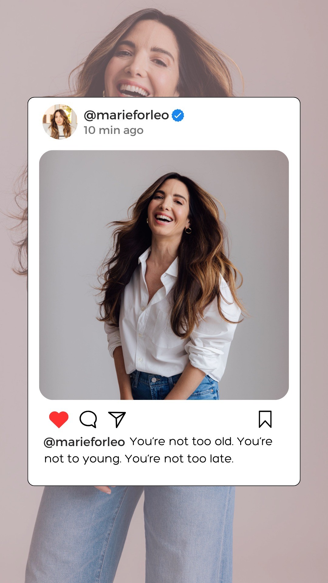 A woman with long, brown hair is laughing and looking to the side, wearing a white button-down shirt and blue jeans. The image is presented within a social media post frame. The text overlay reads: "@marieforleo You're not too old. You're not too young. You're not too late." The post also includes a heart icon, a comment icon, and a share icon.