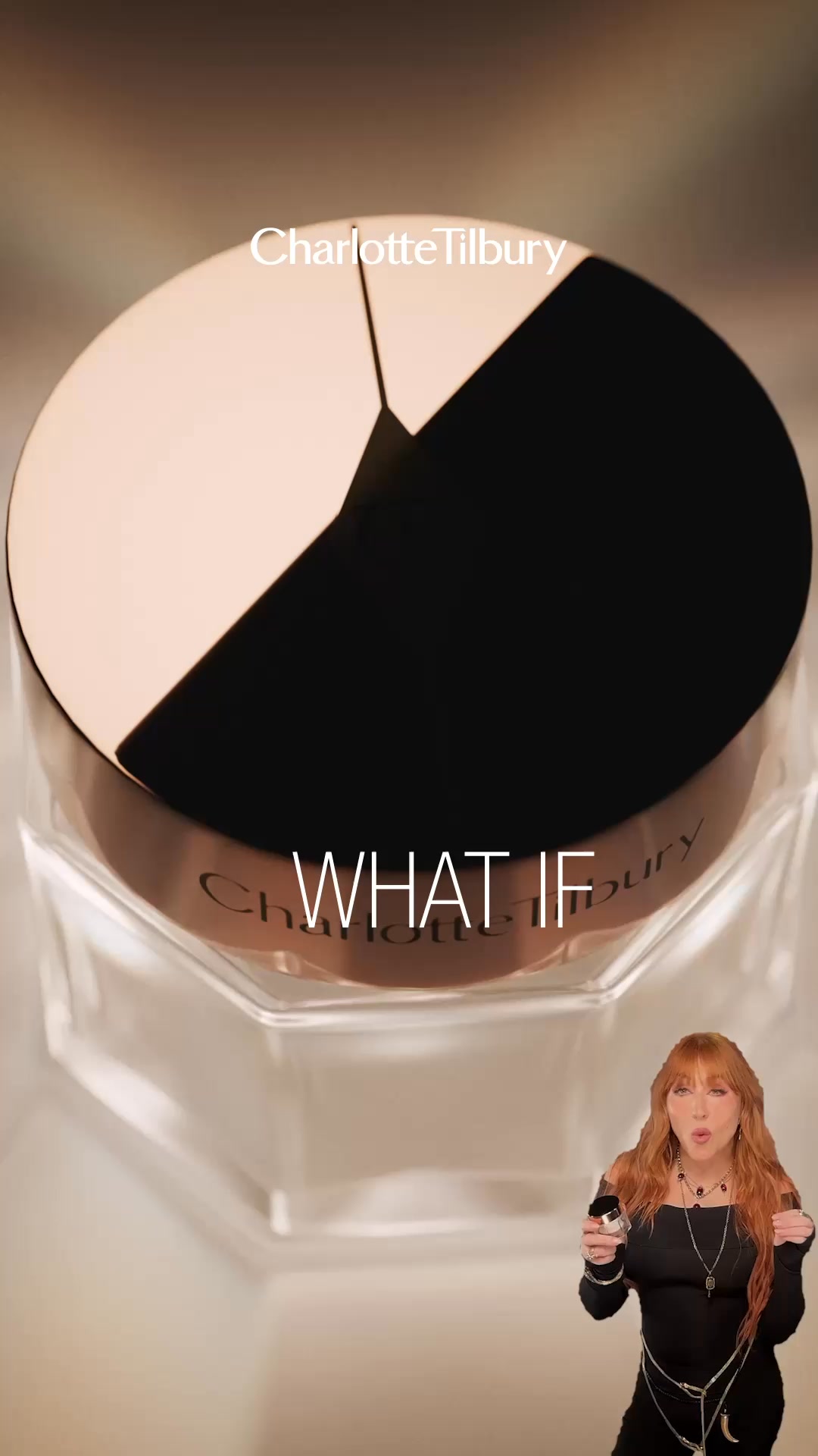 A close-up shot of a Charlotte Tilbury product jar is shown with the text "WHAT IF" overlaid on it. A woman with red hair, dressed in black, is visible in the lower right corner of the frame, holding a small jar and looking towards the camera. The product jar is the main focus, with the brand name "Charlotte Tilbury" subtly visible on its side. The overall aesthetic is luxurious and focused on the product's potential benefits.