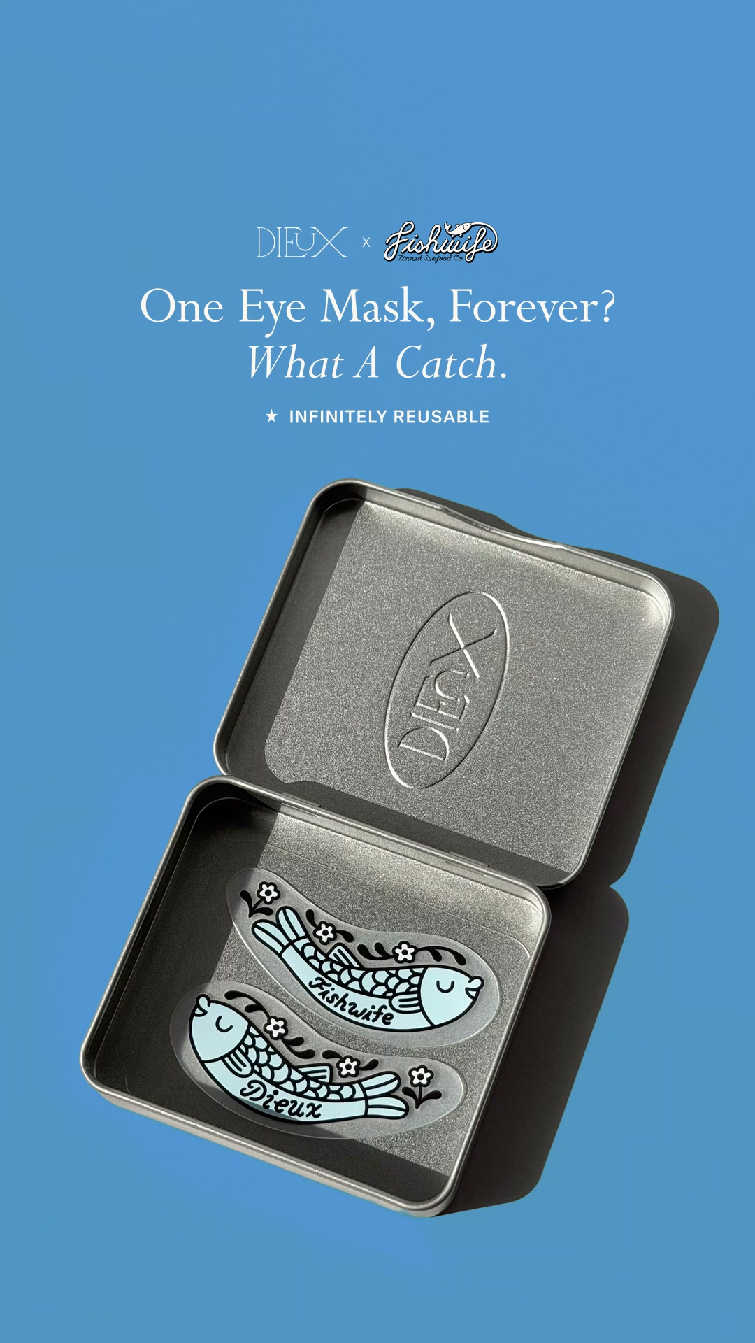 An open, silver tin case reveals two reusable eye masks with a light blue fish design. The top of the tin has the embossed logo "DIEUX". The eye masks have small white flowers and the words "Fishwife" and "Dieux" printed on them. Above the tin, text reads "DIEUX x Fishwife" and "One Eye Mask, Forever? What A Catch." Below this, a smaller line states "★ INFINITELY REUSABLE" against a solid blue background.
