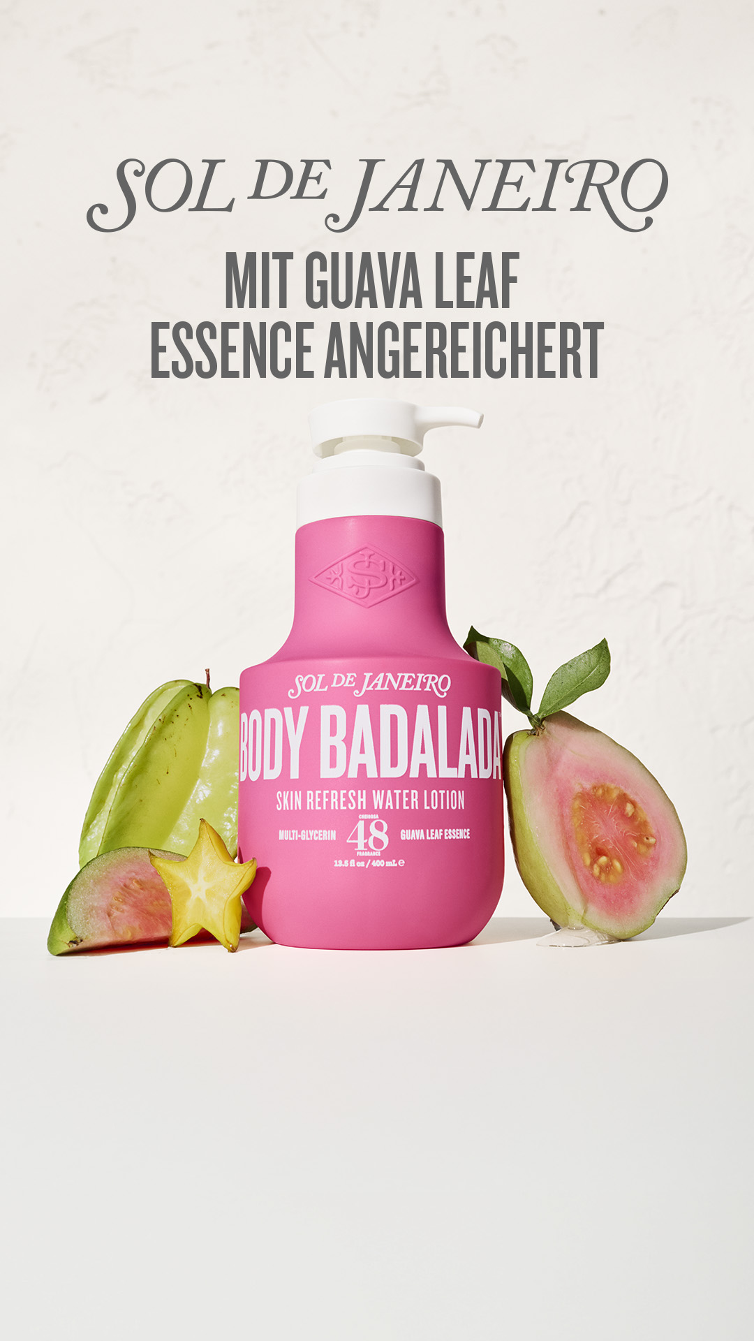 A bright pink bottle of Sol de Janeiro Body Bumbum Cream is centered on a white surface, surrounded by sliced starfruit and guava. Text overlays the image, with the brand name and product name prominently displayed. Additional text highlights the product's key feature: an ultra-light water-gel texture, suggesting a refreshing and easily absorbed formula.