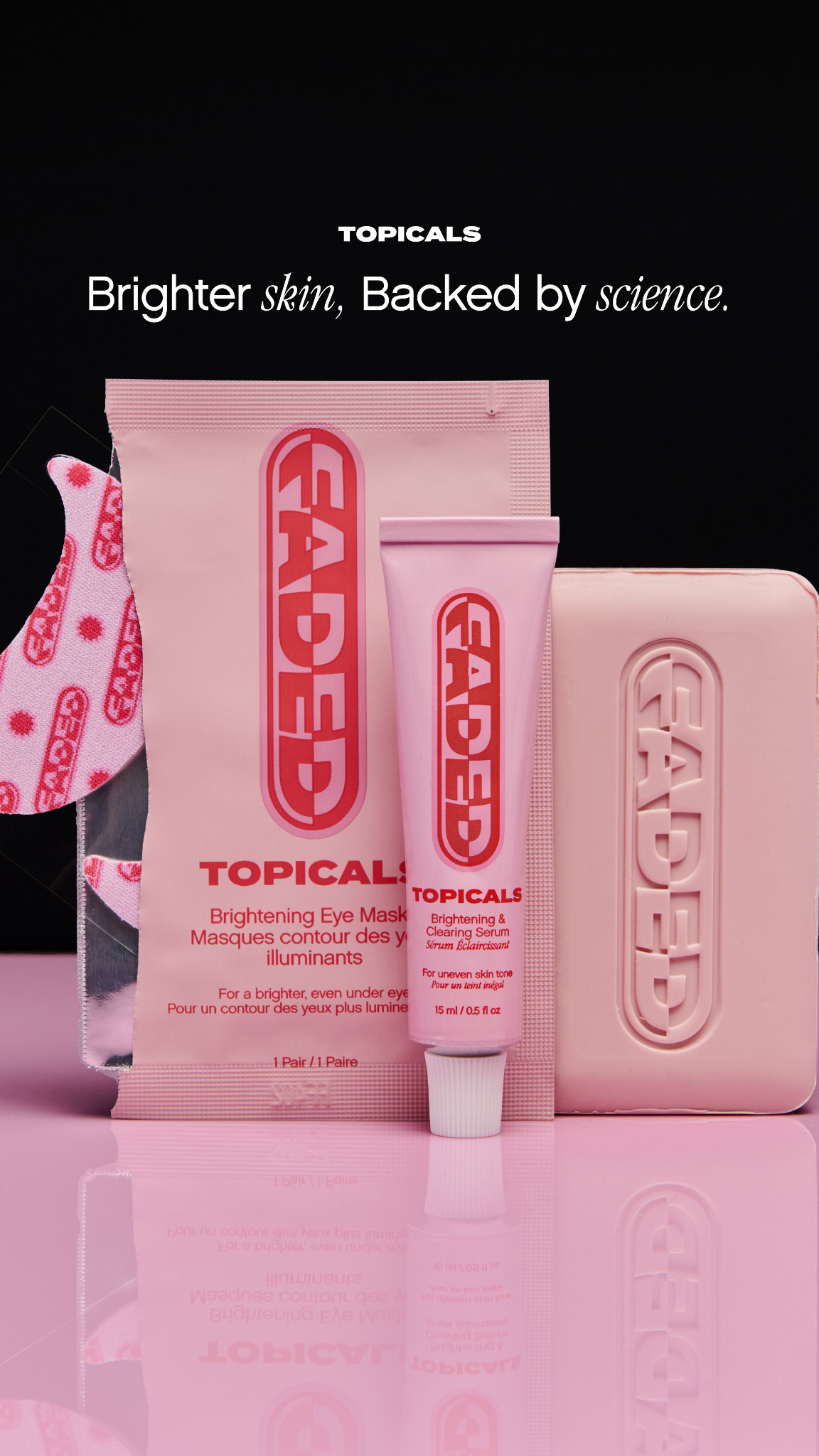 A clean, pink surface reflects a collection of Topicals skincare products against a black background. The products include a pink tube of serum, a pink package of eye masks, and a pink bar of soap, all featuring the brand's 'FADED' logo in red. Overlay text in white reads "TOPICALS" and "Brighter skin, Backed by science." The hook "New to Topicals? Welcome." is also displayed prominently.