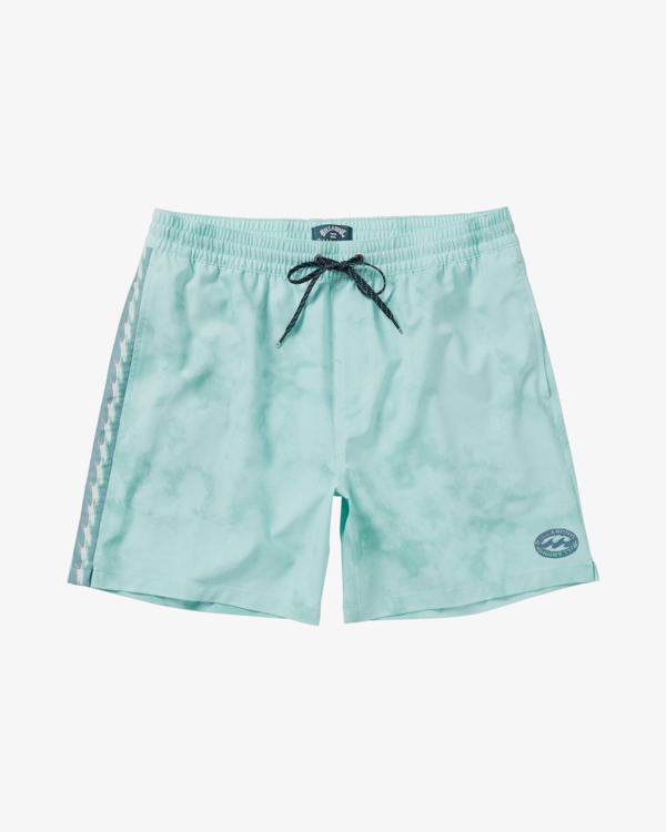A pair of light blue, tie-dye patterned swim trunks are shown against a plain grey background. The trunks have a drawstring at the waist and a branded logo on the left leg. A decorative wave pattern runs down the side of the left leg. Text overlaying the image reads: "Your next adventure is just a click away—don’t leave your cart hanging! Free shipping and returns with Billabong Crew."