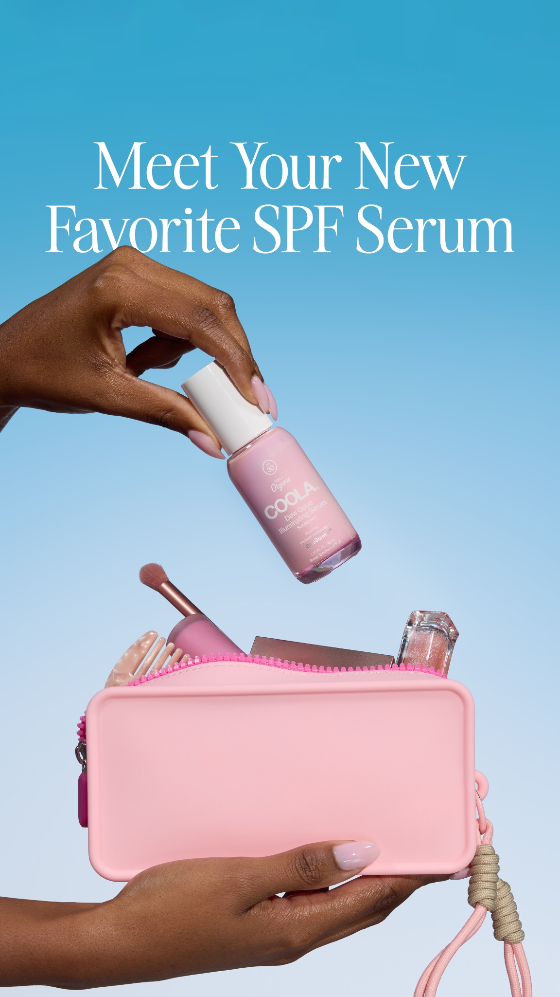 A hand with manicured nails holds a pink makeup bag filled with beauty products. The hand is lifting a bottle of COOLA Dew Good Illuminating Serum with SPF 30 against a bright blue sky background. White text overlaying the top of the image reads "Meet Your New Favorite SPF Serum."