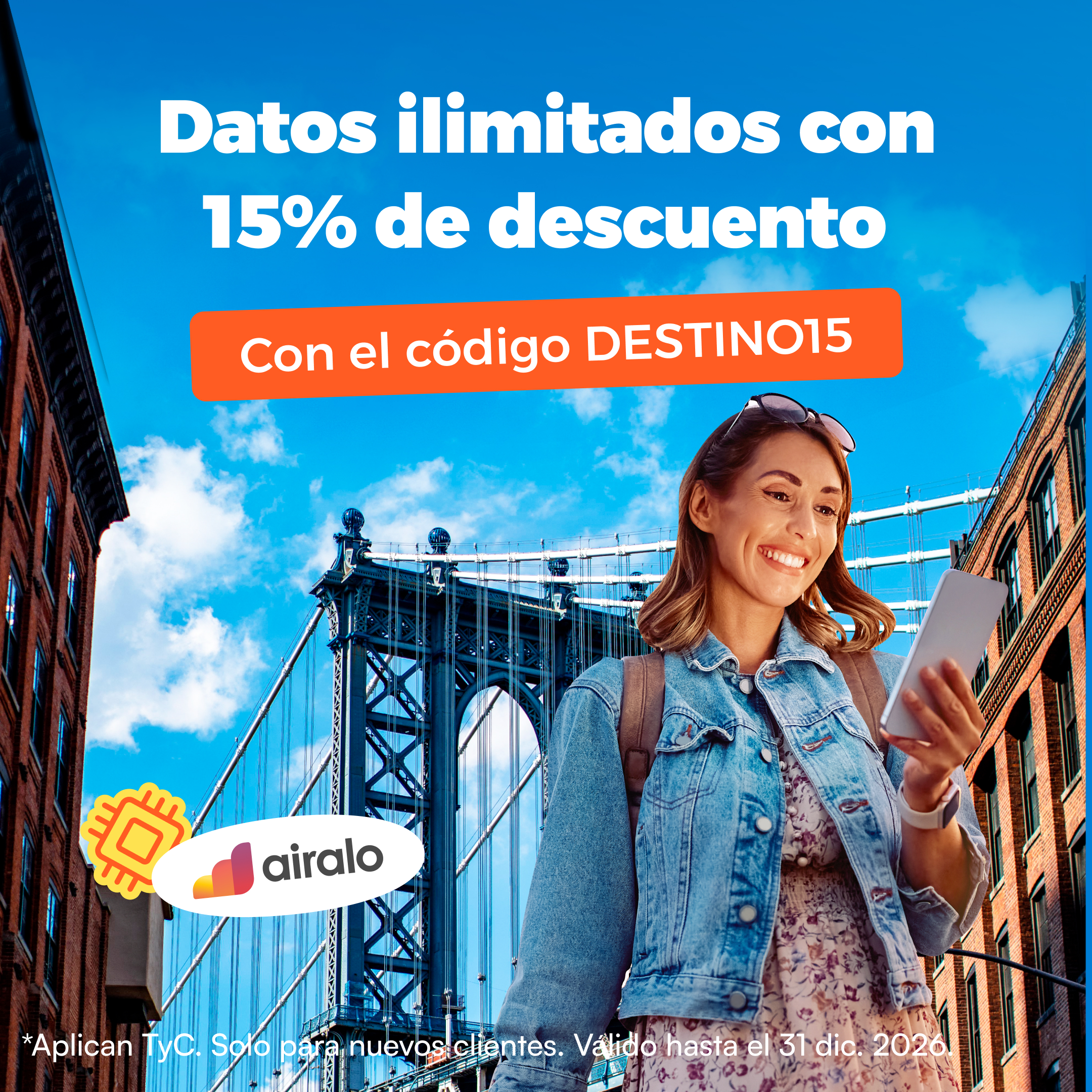 A woman is smiling and looking at her phone while standing in front of the Manhattan Bridge in New York City. The text on the screen reads "Unlimited data with 15% discount" and "With code DESTINO15". The Airalo logo is visible in the bottom left corner. The ad also includes a disclaimer about terms and conditions and validity until December 31, 2026.