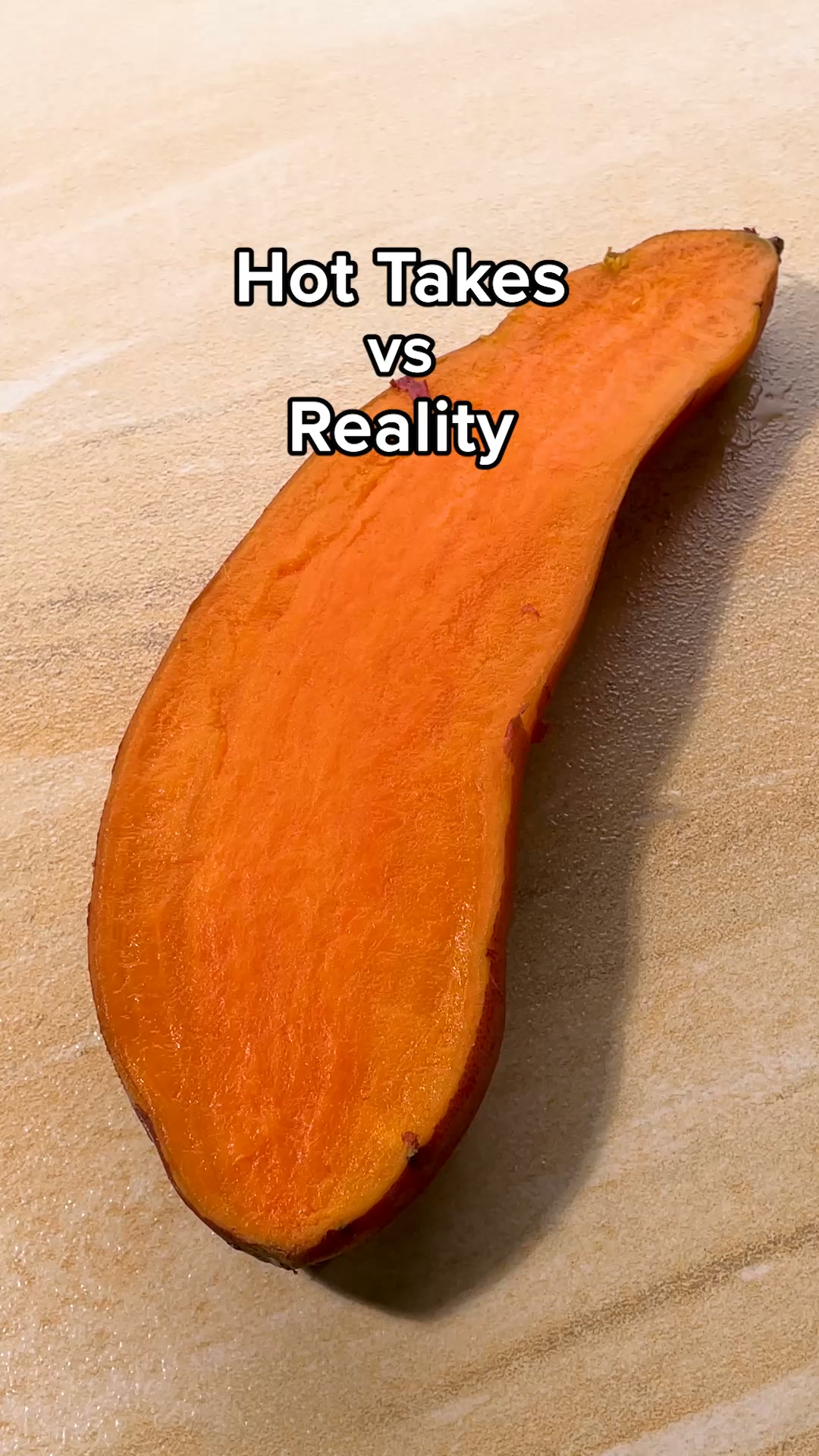 A close-up, top-down view of a halved sweet potato is shown against a textured, light-colored surface. Bold, white text with a black outline is overlaid on the image, reading "Hot Takes VS Reality." The image itself is the 'reality' part of the text, implying a contrast between common perceptions and the actual nature of the sweet potato.