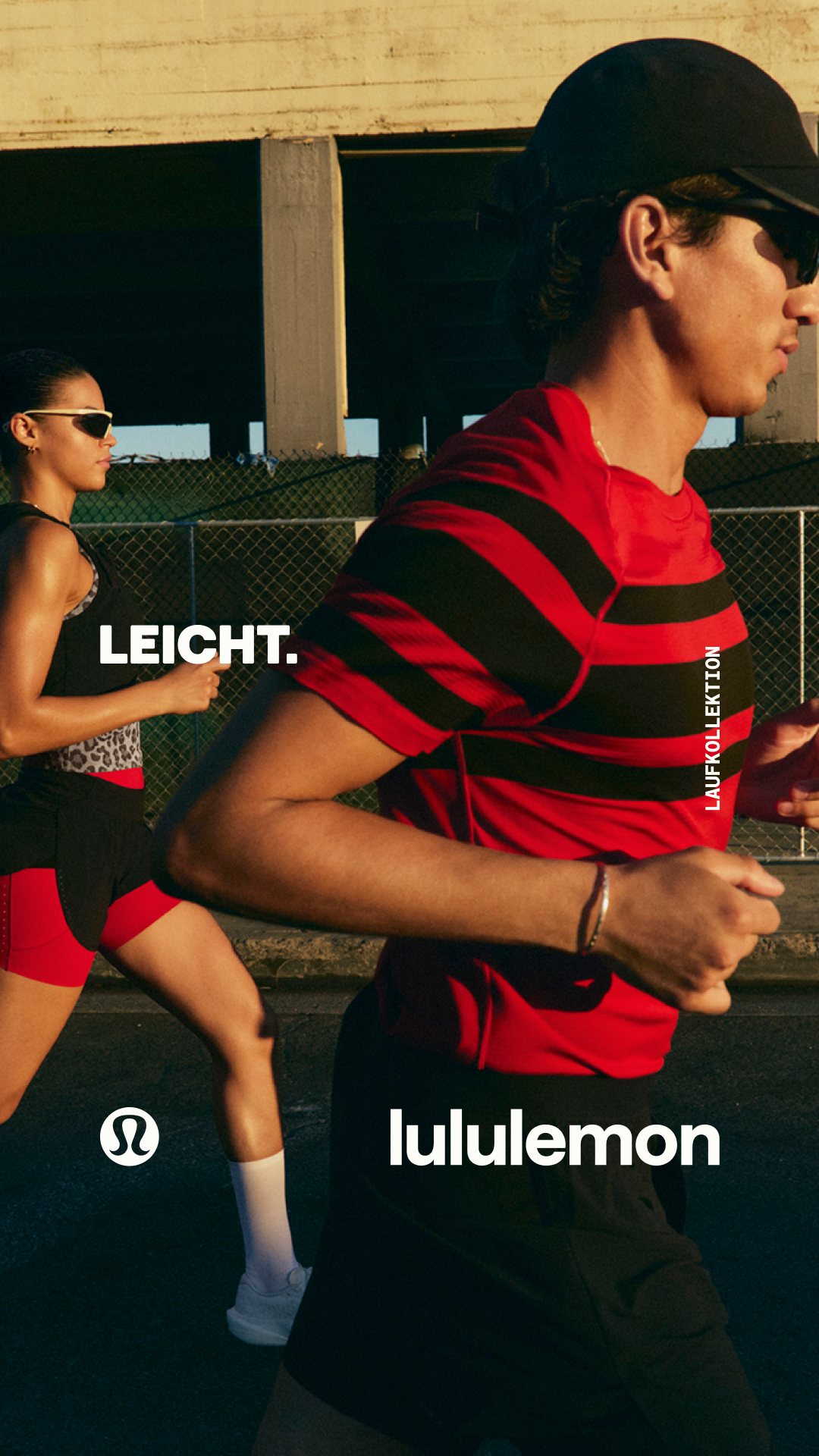 Two individuals are captured in motion, seemingly engaged in a run outdoors. The person on the left wears a black tank top with a leopard print underlayer and red shorts, while the person on the right is dressed in a red and black striped t-shirt and black shorts. White text overlays the image, with "LEICHT." prominently displayed on the left side and "lululemon" on the right. A vertical text element on the right reads "LAUFKOLLEKTION." The Lululemon logo is visible on the lower left.