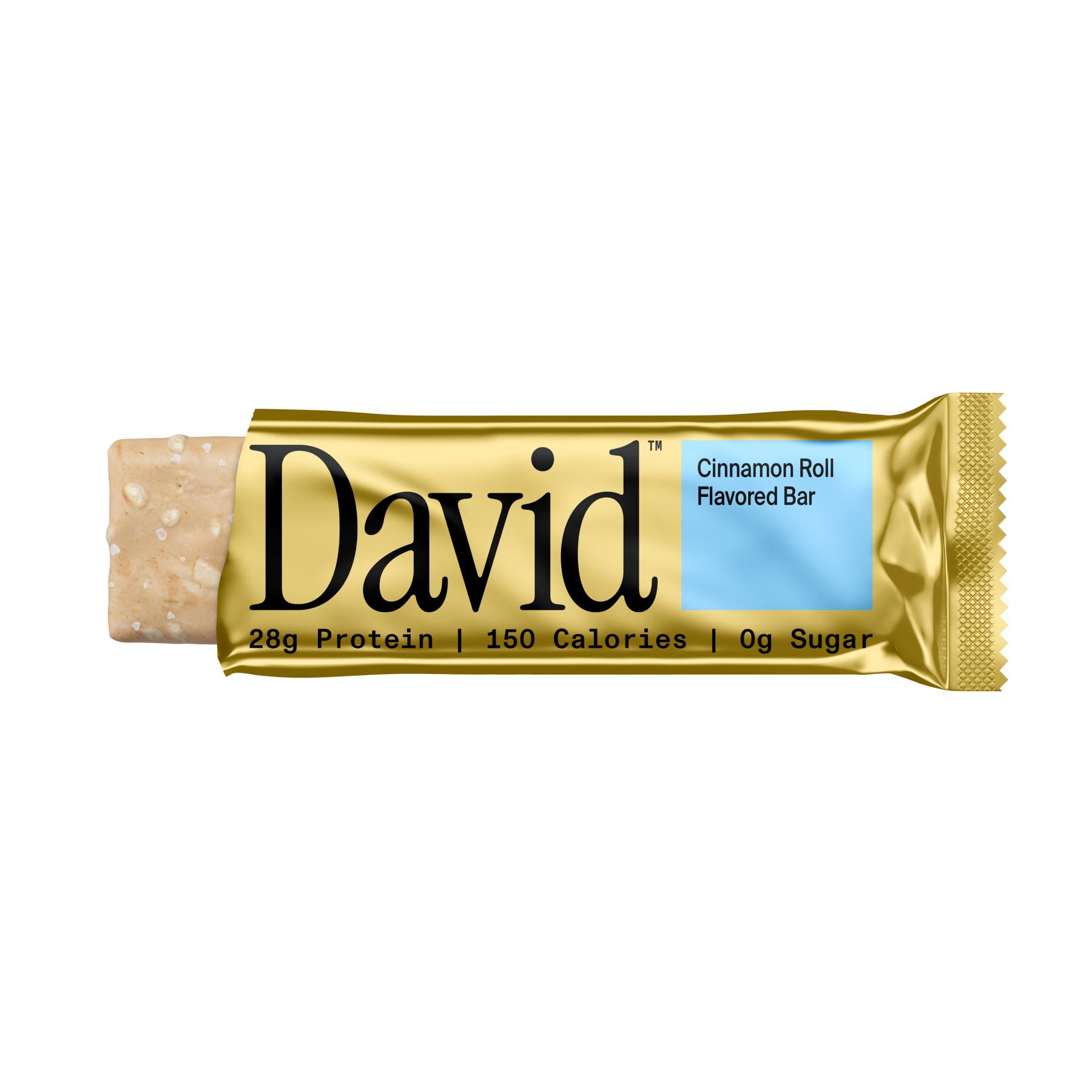 A close-up, studio shot of a David brand protein bar with a gold wrapper. The bar is oriented horizontally, with the wrapper partially open on the left to reveal the light-colored, textured interior. The wrapper features the "David" logo in large black font. To the right of the logo, a light blue rectangle contains the text "Cinnamon Roll Flavored Bar." Below the logo, smaller text reads "28g Protein | 150 Calories | 0g Sugar." The hook "28g protein for back-to-back schedules." is overlaid on the image.