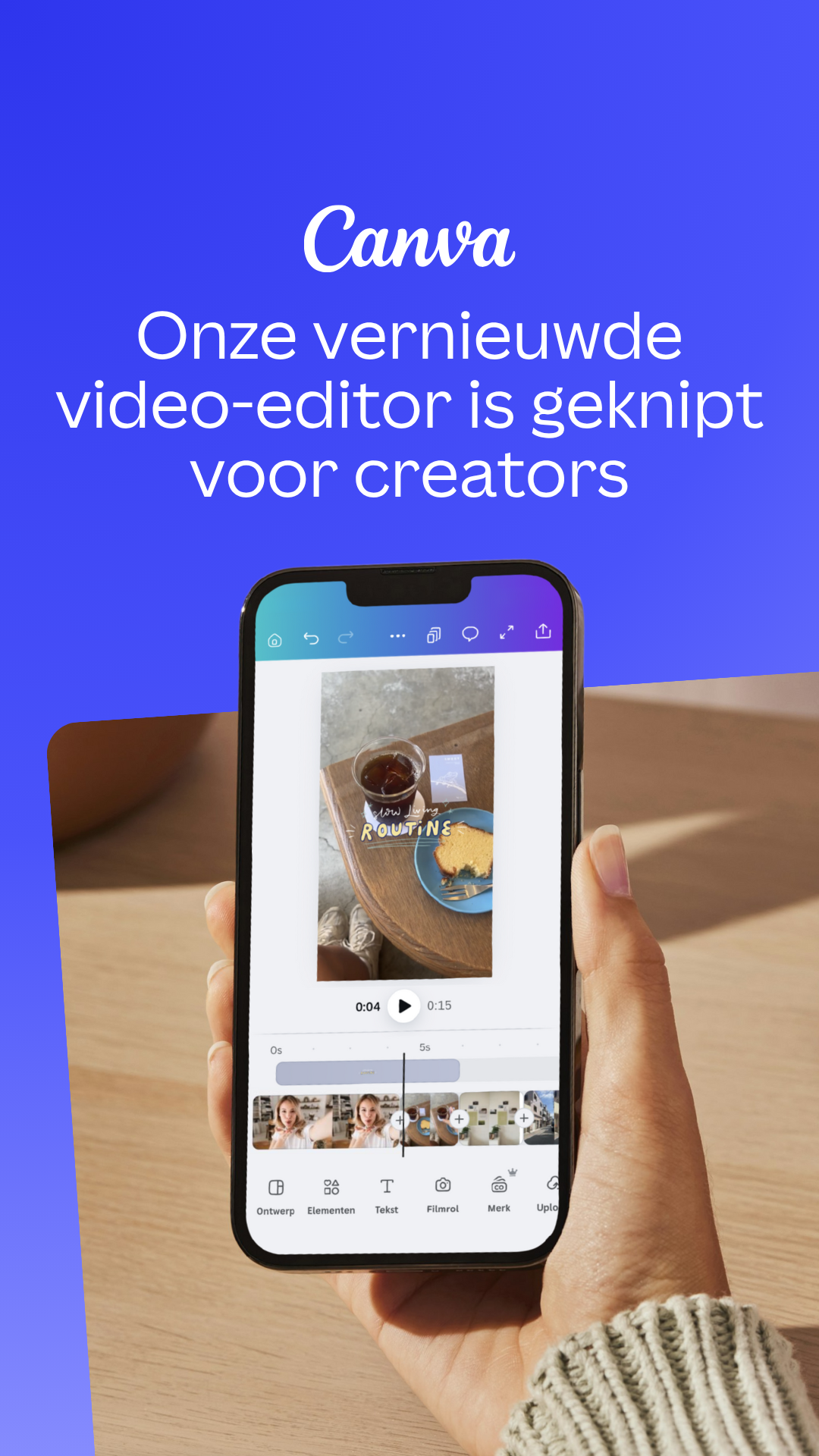 A smartphone is held in a person's hand, displaying the Canva app's video editing interface. The screen shows a short video clip of a slice of cake and a drink on a table, with the text "slow living ROUTINE" overlaid. The app interface includes timeline controls and editing options like 'Ontwerp', 'Elementen', 'Tekst', 'Filmrol', and 'Merk'. The background of the ad is a solid purple color with the Canva logo and text in white.