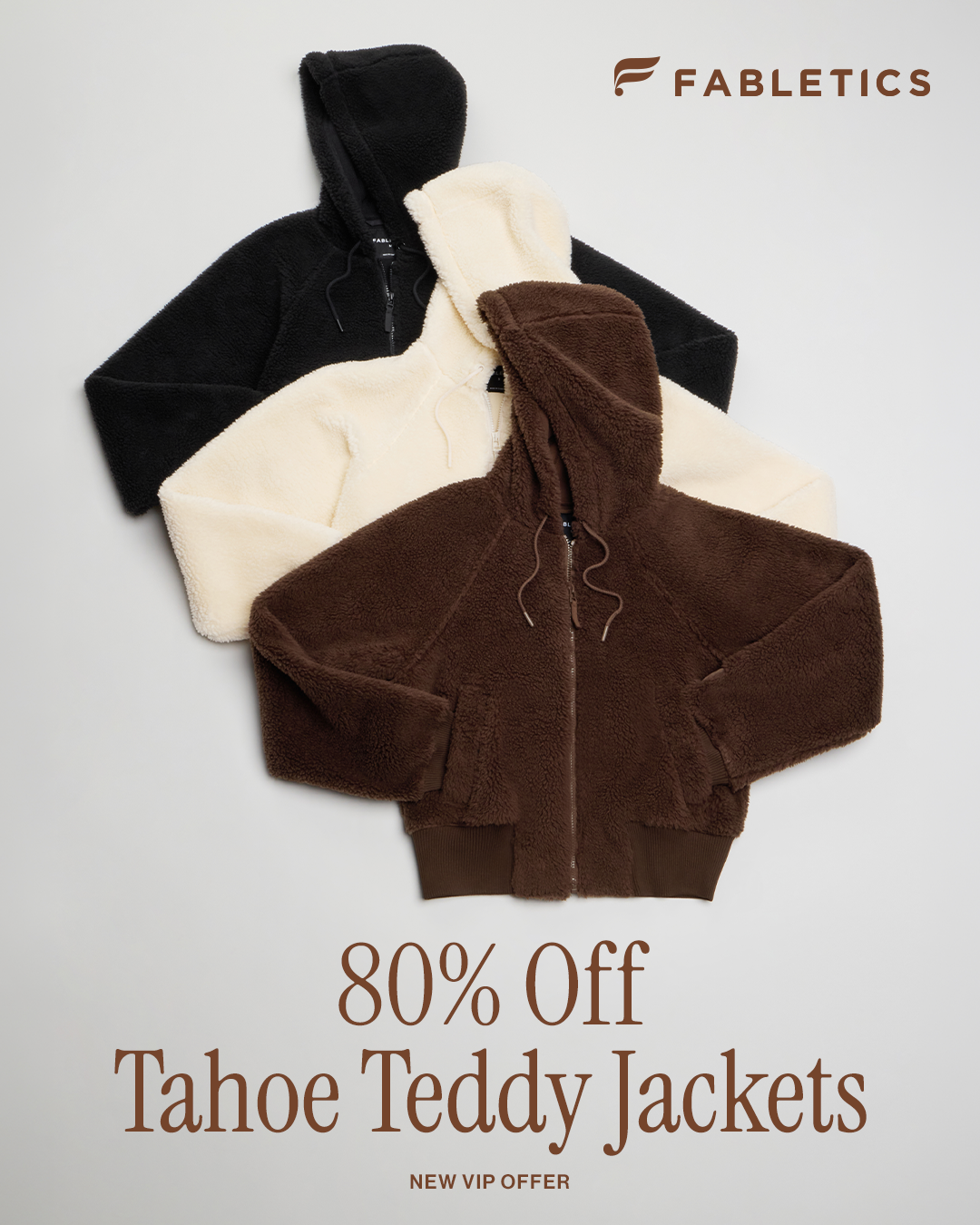Three plush teddy jackets are displayed in black, cream, and brown. The Fabletics logo is in the top right corner. Overlay text reads "80% Off Tahoe Teddy Jackets" and "NEW VIP OFFER" at the bottom. The creative highlights a significant discount on a specific product line.