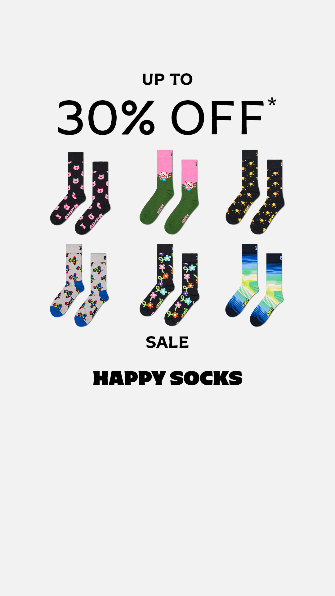 The creative displays an assortment of Happy Socks with various playful patterns, including pigs, trophies, flowers, and stripes. Prominently featured at the top is the text "UP TO 30% OFF*", indicating a sale. Below the socks, the words "SALE" and "HAPPY SOCKS" are displayed in bold, large font, reinforcing the brand and the promotional event.