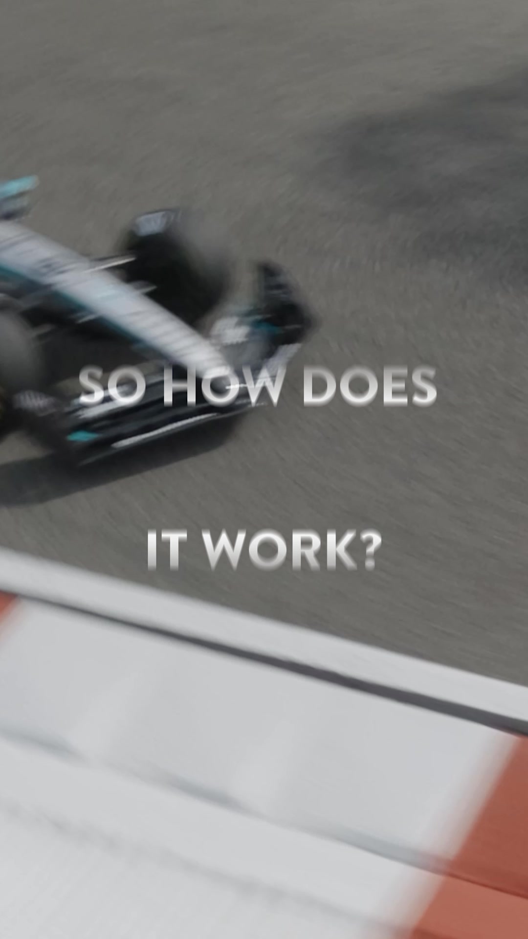 A blurred, dynamic shot of a Mercedes-AMG Petronas Formula 1 car on a race track. White text overlaid on the image reads "SO HOW DOES IT WORK?". The creative is designed to pique the viewer's curiosity about the technology or performance of the car or related products.