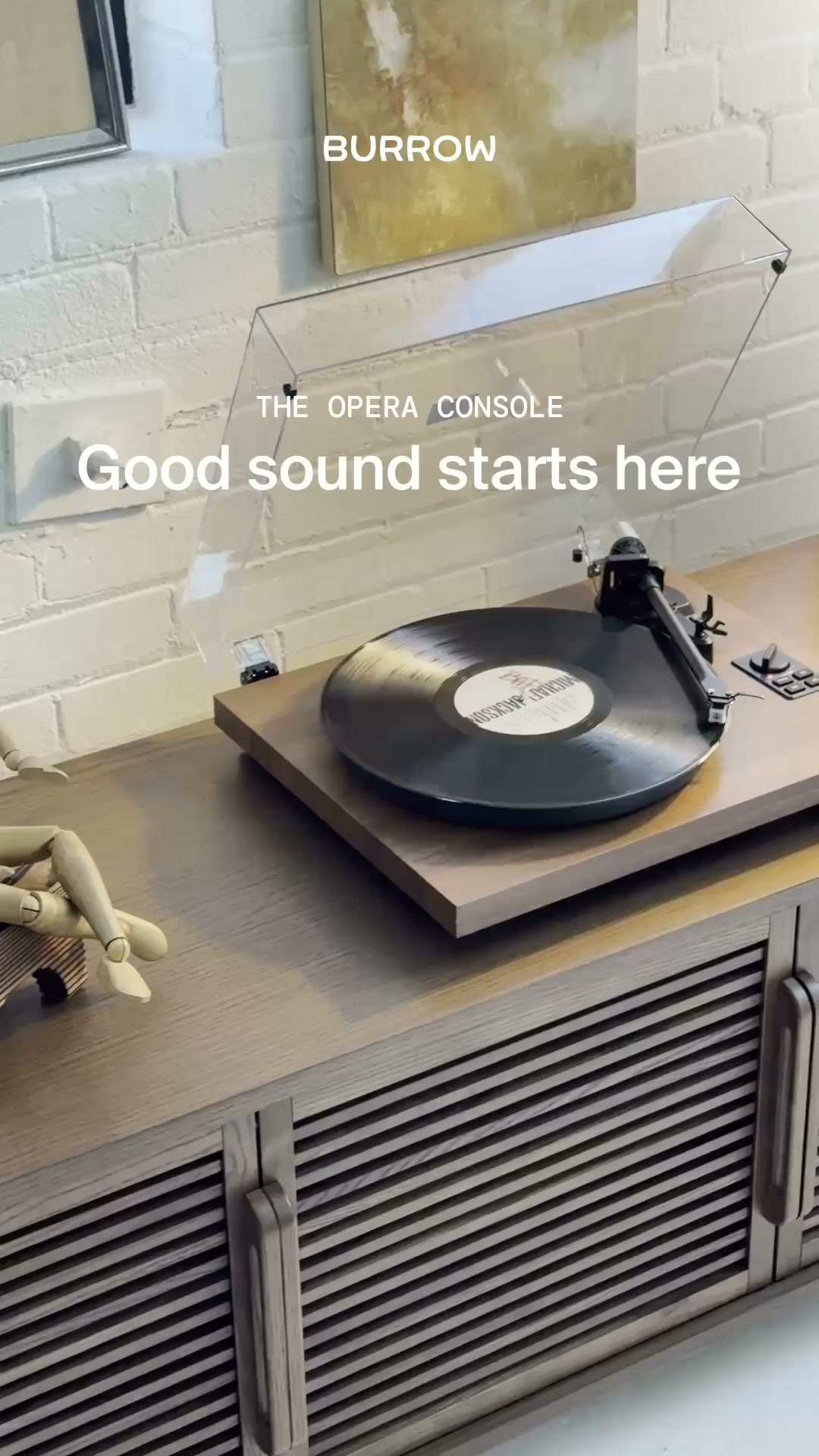 A Burrow media console, named The Opera, is shown with a record player on top. The console has slatted doors and a clean, modern design. Text overlays on the image read "BURROW", "THE OPERA CONSOLE", and "Good sound starts here". The hook states "Black Friday starts now." and the copy mentions a sale of up to 40% off.
