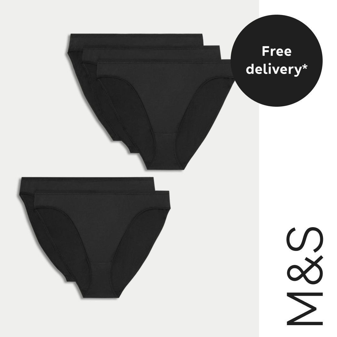 A product shot of several black briefs is displayed against a light grey background. A black circle in the upper right corner contains the text "Free delivery*". The M&S logo is visible on the right side of the image. The copy overlays the image, stating "Our new-season bestsellers – and your soon-to-be wardrobe favourites."
