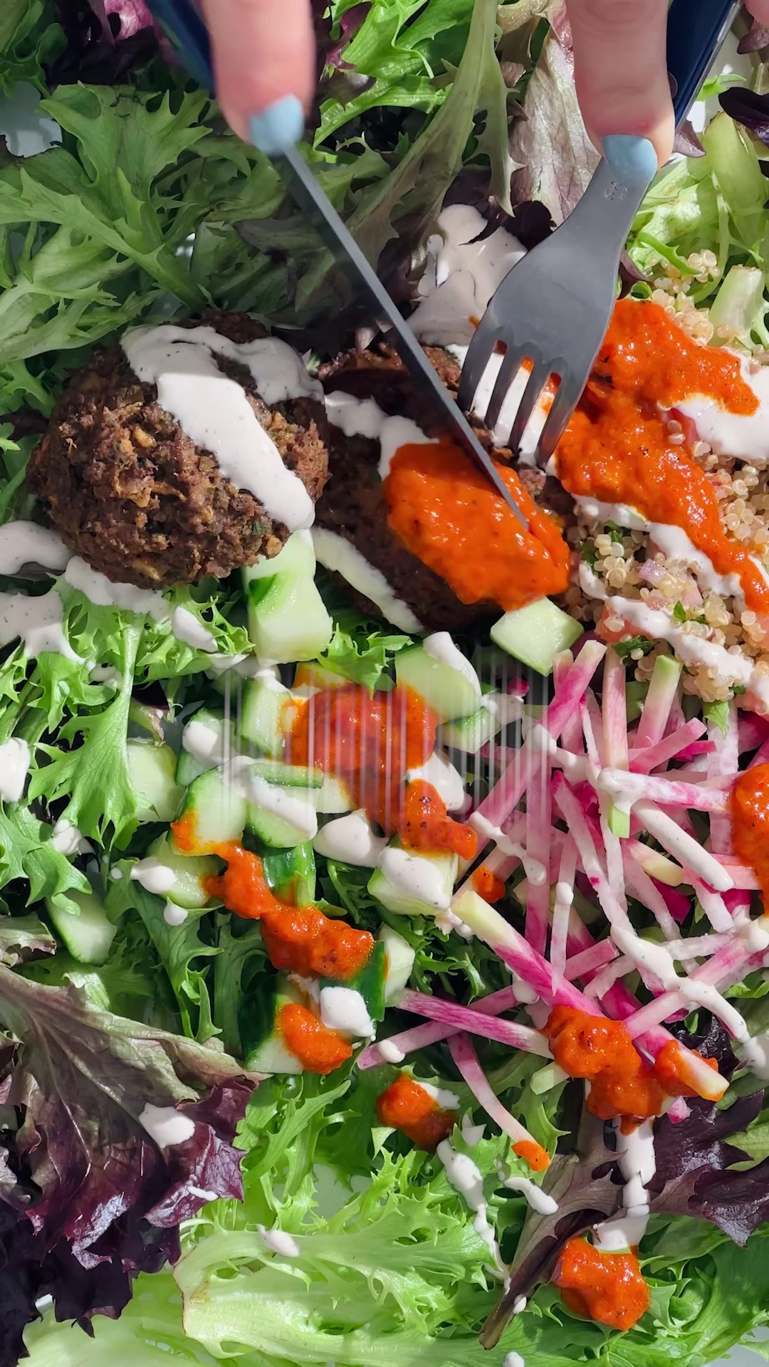 A close-up shot shows a person cutting into a vibrant and fresh salad bowl filled with greens, falafel, quinoa, cucumbers, and radishes. The salad is drizzled with a creamy white sauce and a red sauce. The text overlay features a testimonial from a customer named Cynthia F, who praises the variety and speed of meal preparation.